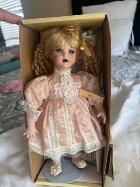 Vintage-Style Porcelain Doll in Pink Lace Dress with Blonde Curly Hair